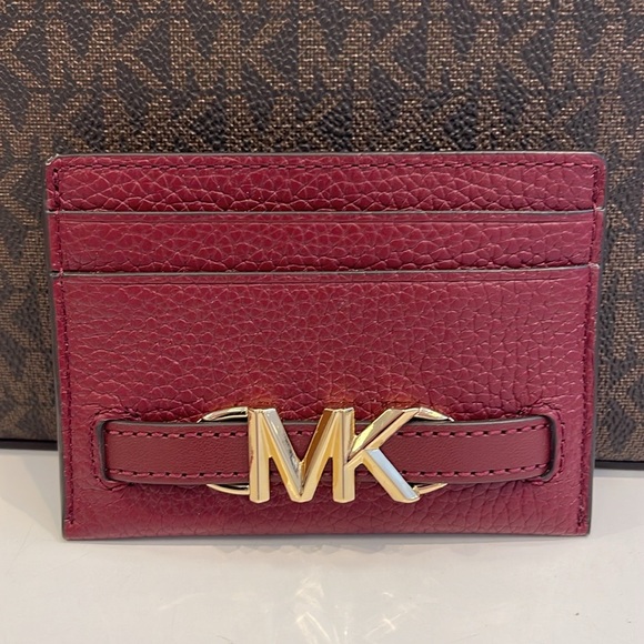 MICHAEL KORS
Reed Large Pebbled Leather Card Holder Case
Dark Cherry 
NWT - Picture 11 of 16